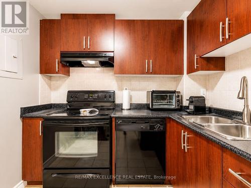 912 - 6720 Glen Erin Drive, Mississauga, ON - Indoor Photo Showing Kitchen With Double Sink