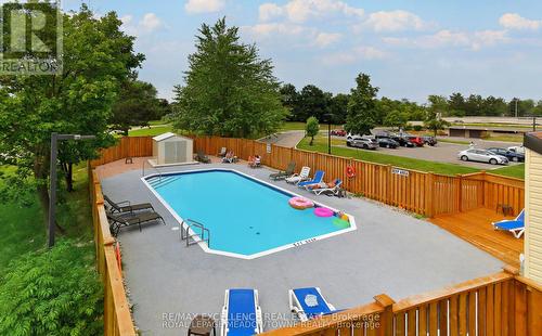 912 - 6720 Glen Erin Drive, Mississauga, ON - Outdoor With In Ground Pool