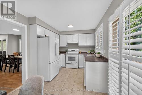5660 Rosaline Road, Burlington, ON - Indoor Photo Showing Kitchen With Double Sink