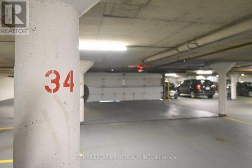 401 - 2263 Marine Drive, Oakville, ON - Indoor Photo Showing Garage