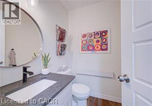 Modern vanity with integrated rectangular sink and matte black faucet - 290 William Street, Elmira, ON - Indoor Photo Showing Bathroom
