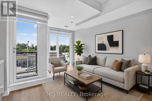 Virtually Staged Living Room - 405 - 90 Glen Everest Road, Toronto, ON - Indoor Photo Showing Living Room