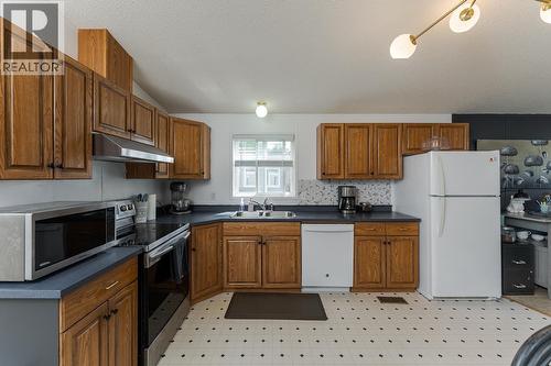 35 5164 Hart Highway, Prince George, BC - Indoor Photo Showing Kitchen With Double Sink