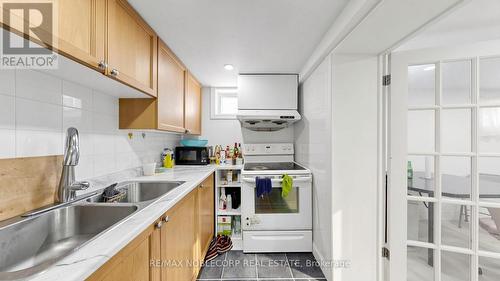 95 Snowood Court, Toronto, ON - Indoor Photo Showing Kitchen With Double Sink