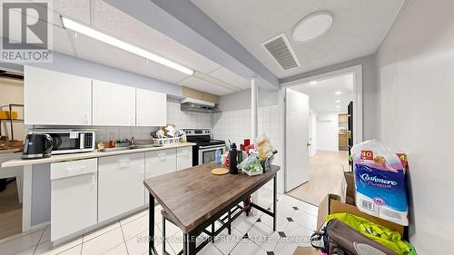 95 Snowood Court, Toronto, ON - Indoor Photo Showing Kitchen With Double Sink