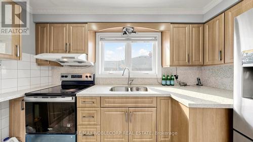 95 Snowood Court, Toronto, ON - Indoor Photo Showing Kitchen With Double Sink