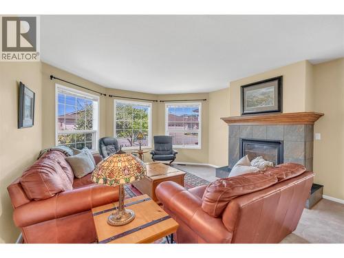 3333 South Main Street Unit# 93, Penticton, BC - Indoor Photo Showing Living Room With Fireplace