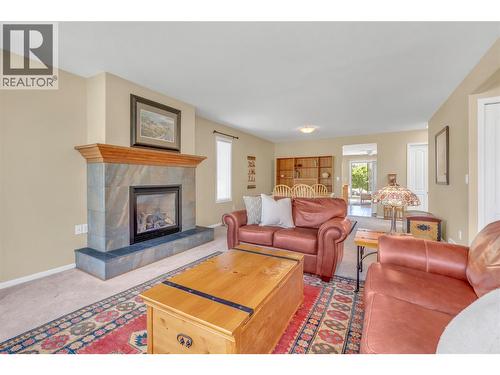 3333 South Main Street Unit# 93, Penticton, BC - Indoor Photo Showing Living Room With Fireplace