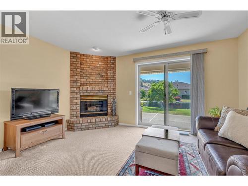 3333 South Main Street Unit# 93, Penticton, BC - Indoor Photo Showing Living Room With Fireplace