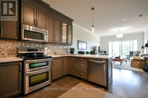 605 - 80 Orchard Point Road, Orillia, ON - Indoor Photo Showing Kitchen With Stainless Steel Kitchen