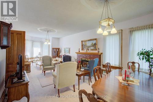 291 Elma Street E, North Perth (Listowel), ON - Indoor Photo Showing Dining Room With Fireplace