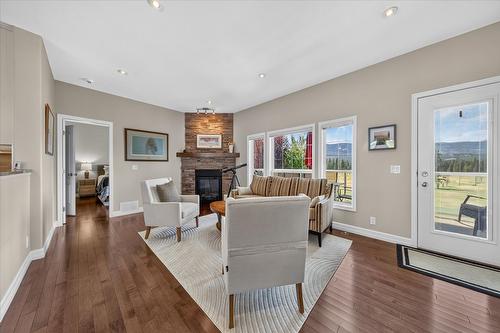 5075 Riverview Road, Fairmont Hot Springs, BC - Indoor Photo Showing Living Room With Fireplace