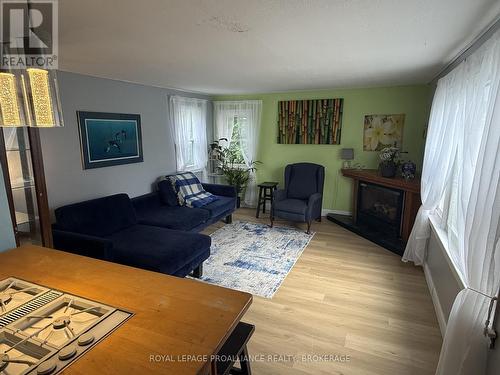 10 Potter Drive, Loyalist (Odessa), ON - Indoor Photo Showing Living Room With Fireplace