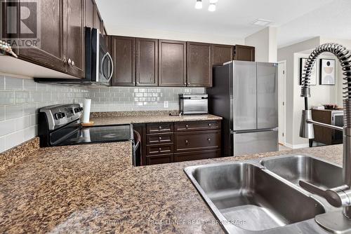 1571 Crimson Crescent, Kingston (City Northwest), ON - Indoor Photo Showing Kitchen With Double Sink