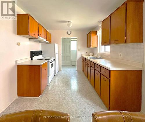 15 Resolution Crescent, Toronto, ON - Indoor Photo Showing Kitchen With Double Sink