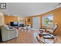 535 Curtis Road, Kelowna, BC  - Indoor Photo Showing Living Room With Fireplace 