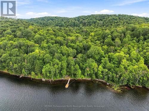 1075 Nanook Lane, Highlands East (Monmouth), ON - Outdoor With Body Of Water