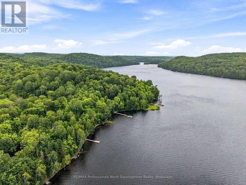 1075 Nanook Lane, Highlands East (Monmouth), ON - Outdoor With Body Of Water With View