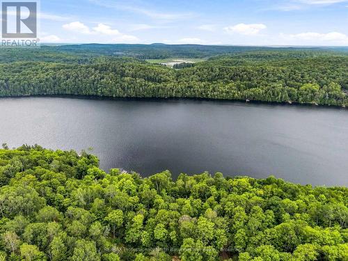 1075 Nanook Lane, Highlands East (Monmouth), ON - Outdoor With Body Of Water With View