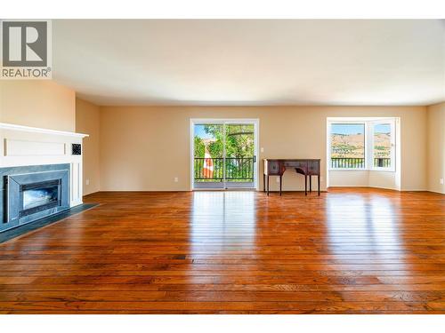 7315 Longacre Drive, Vernon, BC - Indoor Photo Showing Living Room With Fireplace