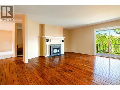7315 Longacre Drive, Vernon, BC - Indoor Photo Showing Living Room With Fireplace