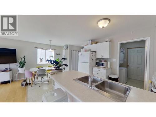 9703 93 Street, Fort St. John, BC - Indoor Photo Showing Kitchen With Double Sink