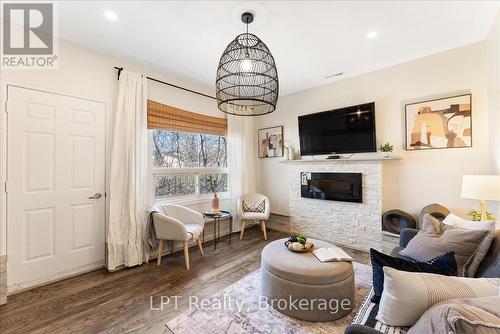 154 Beach Road, Georgina (Keswick North), ON - Indoor Photo Showing Living Room With Fireplace