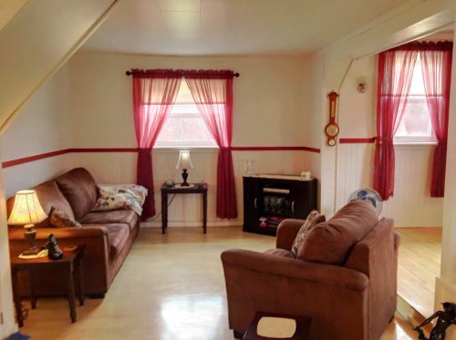 Living Room - 32 Av. Duret, Paspébiac, QC - Indoor Photo Showing Living Room With Fireplace