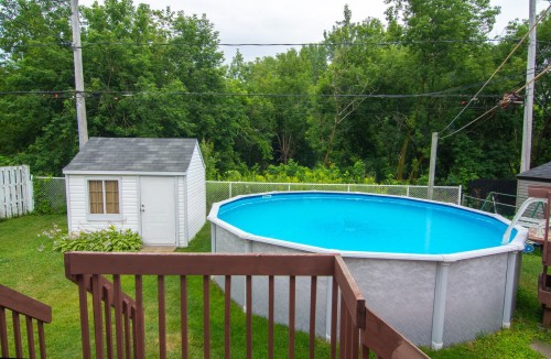 Pool - 1885 Rue Legardeur, Longueuil (Saint-Hubert), QC - Outdoor With Above Ground Pool With Backyard