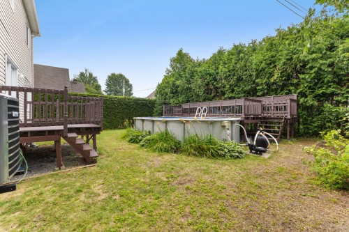 Exterior - 40 Rue Jean-De La Fontaine, Gatineau (Aylmer), QC - Outdoor With Above Ground Pool With Backyard