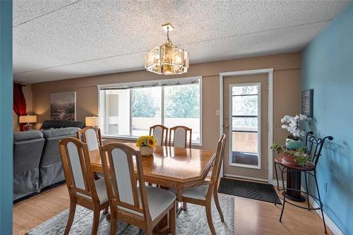 201-85 Swindon Way, Winnipeg, MB - Indoor Photo Showing Dining Room
