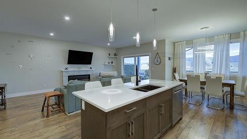 2383 Hawks Boulevard, West Kelowna, BC - Indoor Photo Showing Kitchen With Fireplace With Double Sink