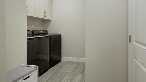 2383 Hawks Boulevard, West Kelowna, BC - Indoor Photo Showing Laundry Room