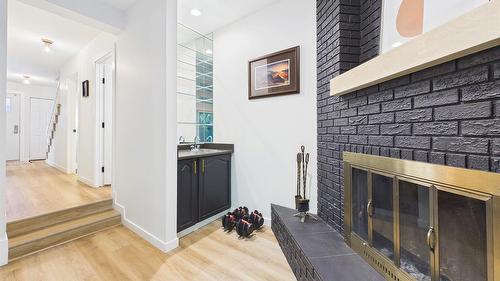 162-1995 Burtch Road, Kelowna, BC - Indoor Photo Showing Other Room With Fireplace