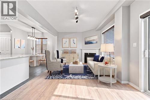 Virtually Staged - 5065 Serena Drive, Beamsville, ON - Indoor With Fireplace