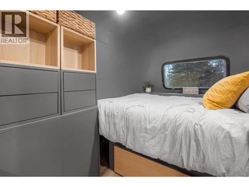 Bedroom, window opens, built in storage - 6474 Deer Run Road Lot# 11, Magna Bay, BC 