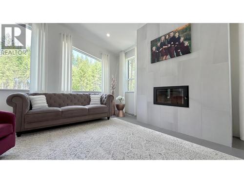 155 Caitlin Road, Christina Lake, BC - Indoor Photo Showing Living Room With Fireplace