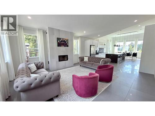 155 Caitlin Road, Christina Lake, BC - Indoor Photo Showing Living Room With Fireplace
