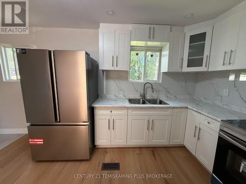 3 Brown Avenue, Kirkland Lake, ON - Indoor Photo Showing Kitchen With Double Sink