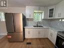 3 Brown Avenue, Kirkland Lake, ON  - Indoor Photo Showing Kitchen With Double Sink 