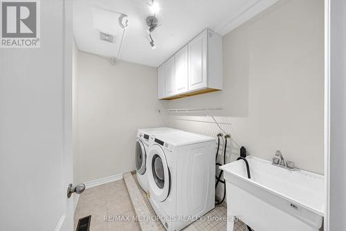 LAUNDRY UPSTAIRS - 23 Gordon Cowling Street, Clarington, ON - Indoor Photo Showing Laundry Room