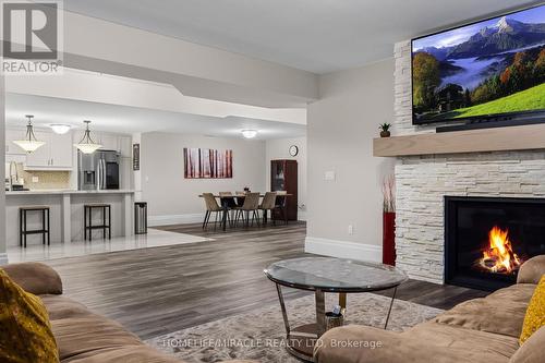 19 - 105 Perryman Court, Erin, ON - Indoor Photo Showing Living Room With Fireplace