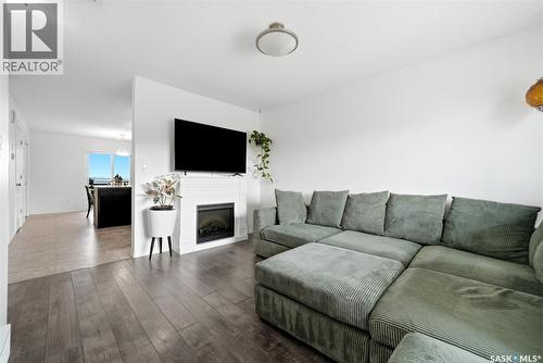 312 3822 Dewdney Avenue E, Regina, SK - Indoor Photo Showing Living Room With Fireplace