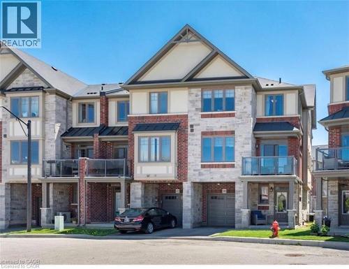 10 Egleston Lane, Ancaster, ON - Outdoor With Balcony With Facade