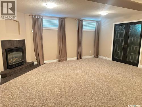 1 Telfer Bay, Prince Albert, SK - Indoor With Fireplace
