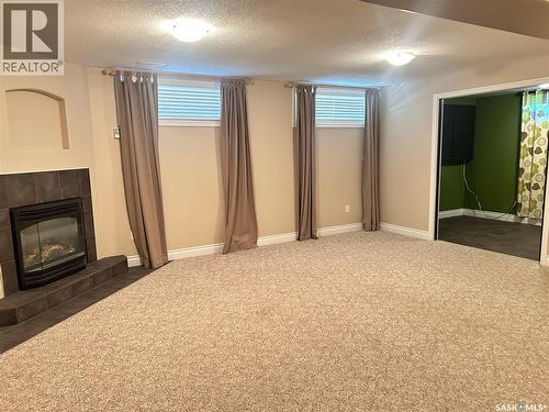 1 Telfer Bay, Prince Albert, SK - Indoor With Fireplace
