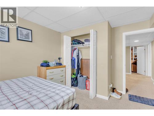 1675 Thayer Court Unit# 1, Kelowna, BC - Indoor Photo Showing Bedroom