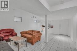Spacious room with white tile flooring and white painted walls - 
