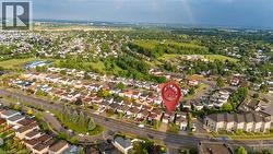 Aerial perspective showcasing a residential neighborhood with varied housing styles - 