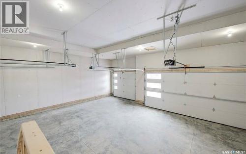 206 Kenaschuk Union, Saskatoon, SK - Indoor Photo Showing Garage